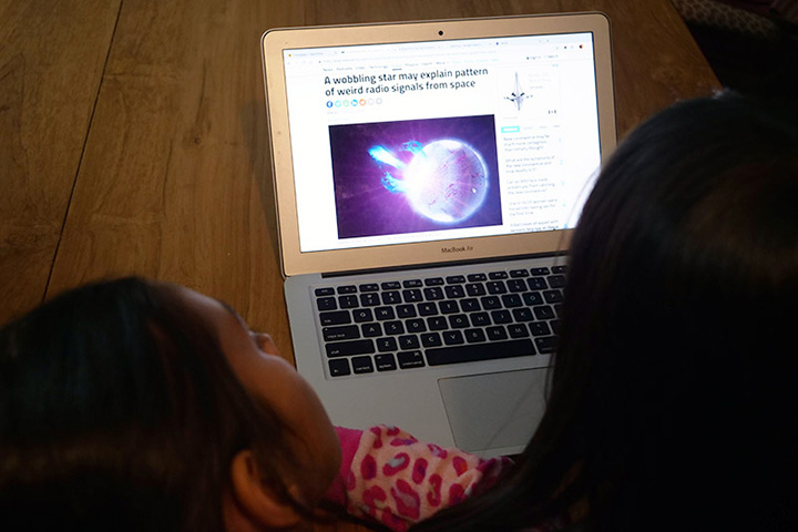 Girls reading new scientist website