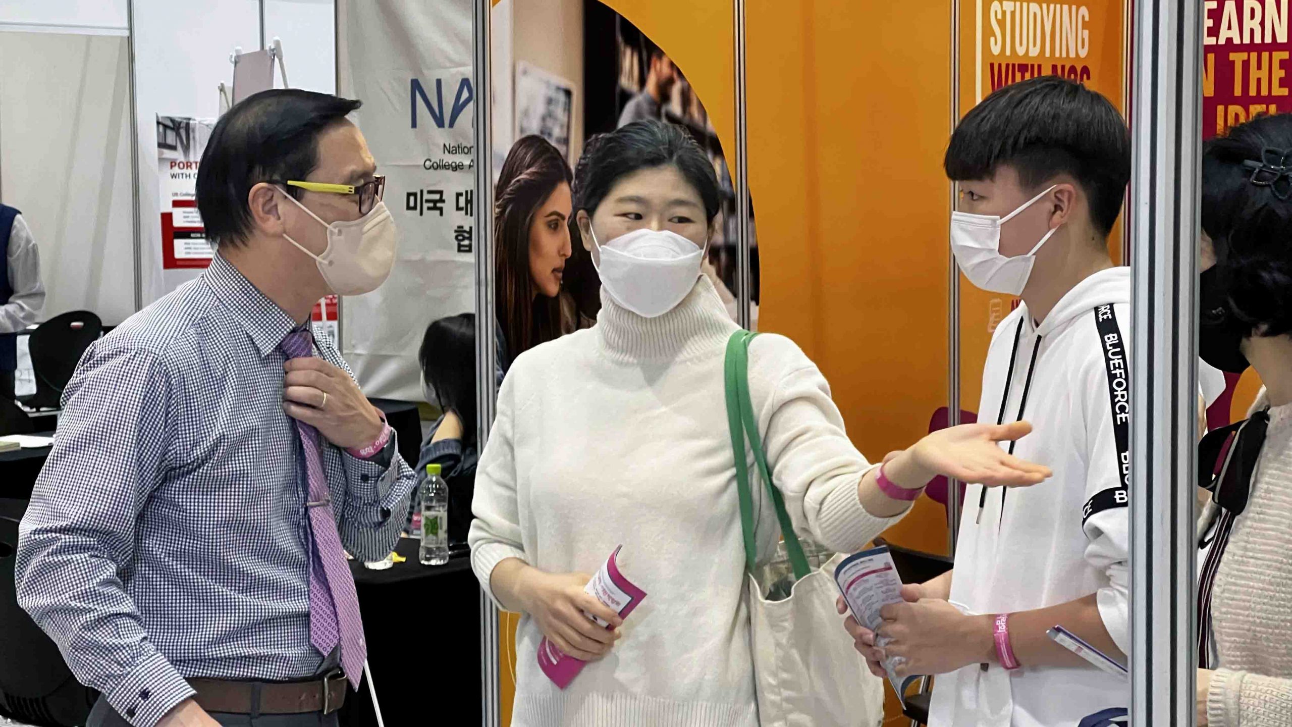 Taeyeong at expo meeting with parents